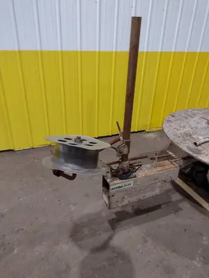 5,500 LBS X 48" AWC (ACCRA-WIRE CONTROLS) MODEL #F-200AF HORIZONTAL PALLET TYPE POWERED DE-COILER: STOCK #19258