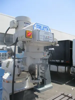 Frejoth (Bridgeport copy) milling machine w/ digital read out feed, 9" x42"table, 3 HP, R8 taper, 220V / 440V, impeccable