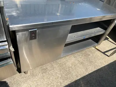 Used Falcon Restaurant Supply Used 61" Stainless Steel Equipment Stand with shelves and outlets - SS122 Restaurant Equipment (Miscellaneous) Illinois US | Falcon Restaurant Supply #1376009