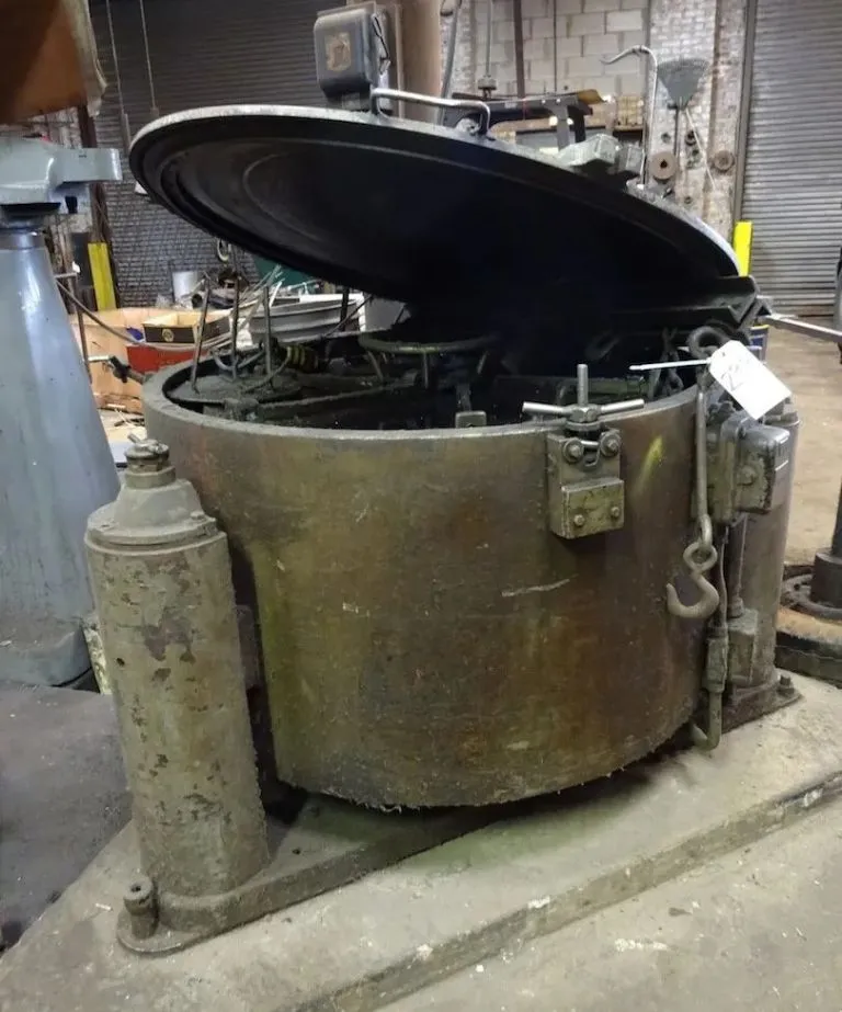 Tolhurst 40" Center-Slung chip wringer.