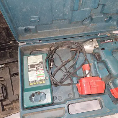 Makita Impact Driver Kit, 2 Batteries, charger and Bostich Air Crown Stapler