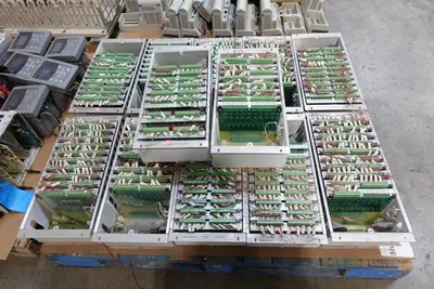 4 PALLETS OF ASSORTED CHASSIS, MODULES AND POWER SUPPLIES; OVATION, HONEYWELL, GE, MODICON