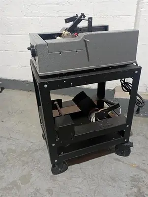 Advent model 310 semi-automatic pressure sensitive wraparound labeler