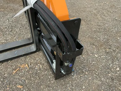 Used WOLVERINE PFA-11-3300G SKID STEER PALLET FORK HYDRAULIC ADJUSTABLE Pallet Forks Michigan US | Miedema Asset Management Group #1457303