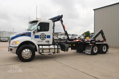 Used 2027 PETERBILT 548 Hooklifts & Roll-Offs Texas US | Roll Off Truck World #1491992