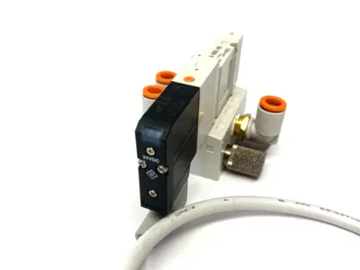 SV1100-5W2U-01N | SMC  5-Port 2-Position Single Solenoid Valve, 1/8" NPT - Used