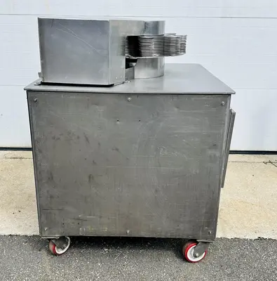 USED URSCHEL 10 STATION SEMI-AUTOMATIC ROTATING ONION SLICER