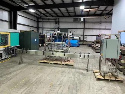 USED APEX FILLING SYSTEMS POF-12 12 SPOUT PRESSURE LIQUID FILLER