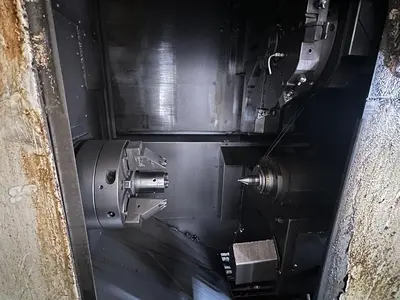 Used FUJI ANW 35 TWIN TURRET CNC LATHE, TAIL STOCK WITH ROBOT LOAD/UNLOAD AND STOCKER TABLES CNC Lathes | Harbor Machinery Inc. #1283395