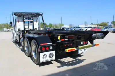 New | in-Stock 2027 PETERBILT 548 Rolloff Trucks Texas US | Roll Off Truck World #1492012