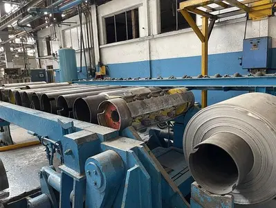310 mm (12.205") & 680 mm (.039") x 1575 mm (62") Spidem/Fata Foil Mill (Used)
