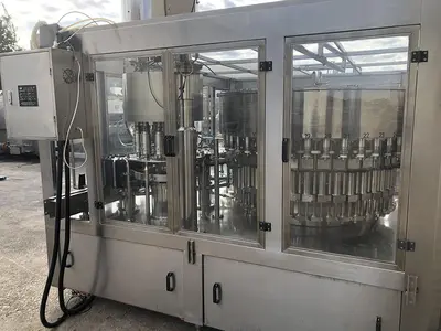 USED 2014 ZHANG J IAGANG, BEIJING CHINA TRI-BLOCK 40 VALVE BOTTLE RINSER, FILLER, CAPPER