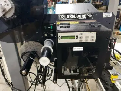 Label-Tronix, labeling system with Lable-Aire 2138 & Reliant 2700 feeder
