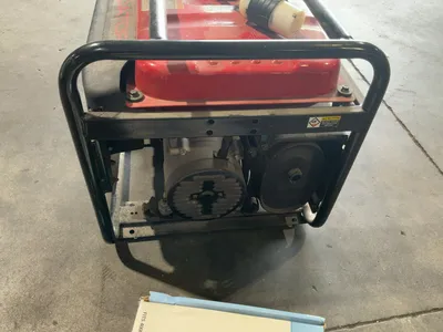 USED PREDATOR 4000 WATT MAX GAS GENERATOR WITH WHEEL KIT