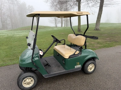 (1) 2014 E-Z-Go golf cart with a Kawasaki gas engine, does not include Club canopy, ball carrier, fo...