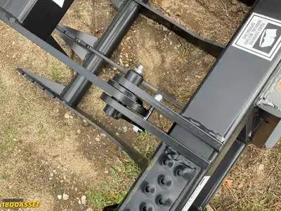 New Tomahawk 66” brush grapple attachment, two hydraulic grapple arms, skid steer quick attach