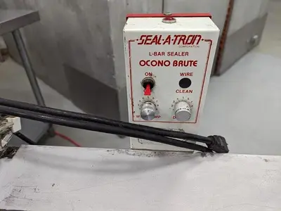 USED SEAL-A-TRON OCONO BRUTE