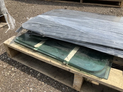 Lot of window glass for semi truck doors and sleeper cabs, used
