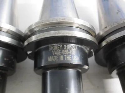 USED BRINEY CAT40